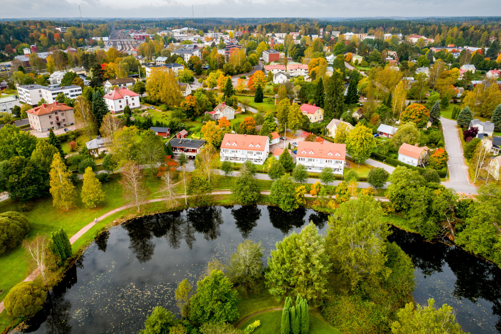 Picture of Pumpviken from a drone, showing the path and the river.
